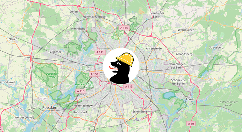  The logo of Hier Baut Berlin, a berlin bear with a construction hat, in front of the berlin map 